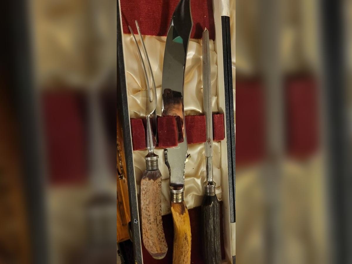 Vintage Sheffield carving set with knife, fork and sharpener in its case