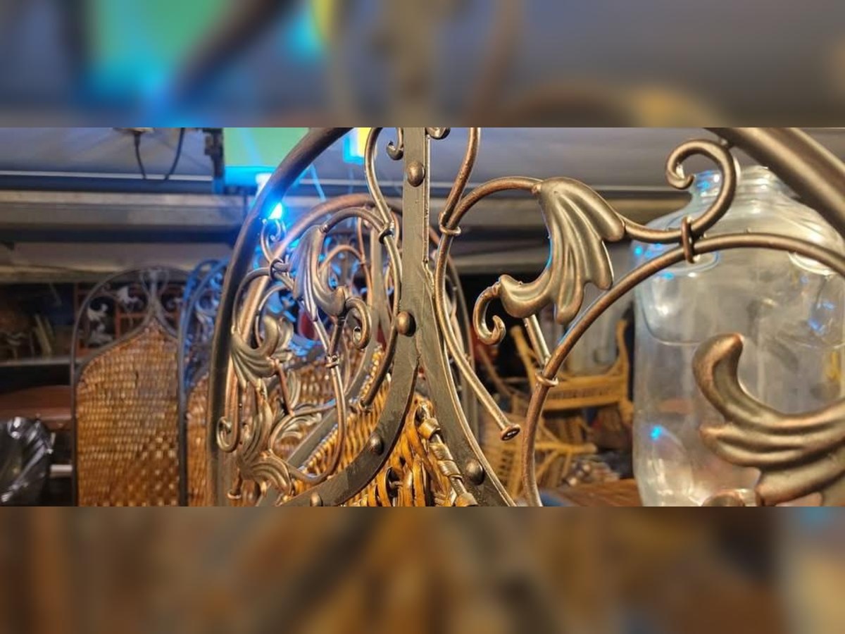 Two 3-panel woven room dividers with ornate metal scrollwork tops